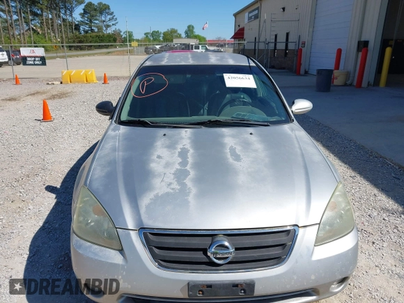 2002 Nissan Altima S with VIN 1N4AL11D12C166490, listed as a IAAI auction lot 42056634 with 203,367 mi miles. Bid and sale history available at carsss.com. Image 6.