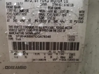 2012 Ford Explorer z VIN 1FMHK8B87CGA78345, wystawiony jako Copart lot #49626515 z przebiegiem 167 876 mil mil oraz Szkoda całkowita • Salvage title. Historia ofert i sprzedaży dostępna na DreamBid. Obrazek 14.