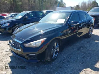 2014 Infiniti Q50 Premium z VIN JN1BV7AP4EM680924, wystawiony jako IAAI lot #41820183 z przebiegiem 125 455 mil mil oraz . Historia ofert i sprzedaży dostępna na DreamBid. Obrazek 17.