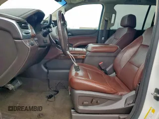 2018 Chevrolet Suburban Premier with VIN 1GNSCJKC5JR184384, listed as a Copart auction lot 53512255 with 161,503 mi miles and Salvage title. Bid and sale history available at DreamBid. Image 7.