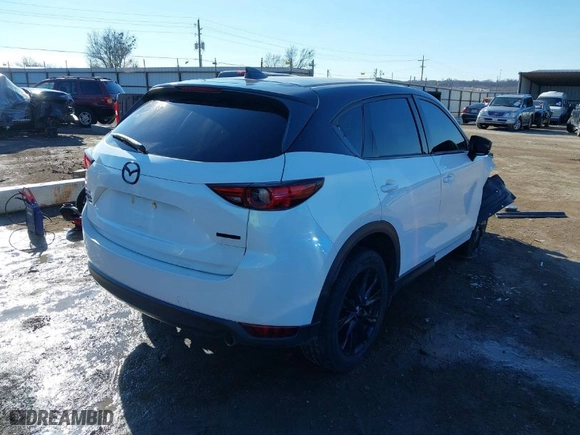 2021 Mazda CX-5 Grand Touring with VIN JM3KFBDM3M0417738, listed as a IAAI auction lot 41308123 with 1 mi miles. Bid and sale history available at carsss.com. Image 4.