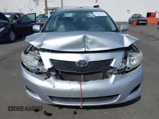 2009 Toyota Corolla with VIN JTDBL40E59J051651, listed as a IAAI auction lot 41874710 with 52,938 mi miles. Bid and sale history available at carsss.com. Image 12.