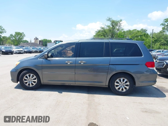 2010 Honda Odyssey EX-L z VIN 5FNRL3H76AB071871, wystawiony jako IAAI lot #42214867 z przebiegiem 255 116 mil mil oraz . Historia ofert i sprzedaży dostępna na DreamBid. Obrazek 14.