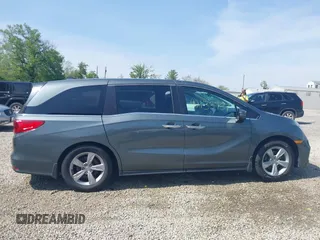2018 Honda Odyssey EX-L z VIN 5FNRL6H77JB096733, wystawiony jako IAAI lot #42133737 z przebiegiem 165 069 mil mil oraz . Historia ofert i sprzedaży dostępna na DreamBid. Obrazek 13.