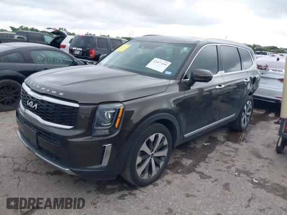 2022 Kia Telluride S with VIN 5XYP64HC3NG256251, listed as a IAAI auction lot 42077499 with 61,402 mi miles and . Bid and sale history available at DreamBid. Image 2.