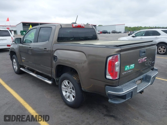 2015 GMC Canyon 2WD SLE with VIN 1GTG5BE38F1229799, listed as a IAAI auction lot 41944801 with 71,165 mi miles. Bid and sale history available at carsss.com. Image 3.