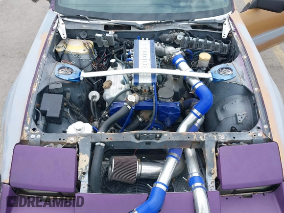 1986 Nissan 300ZX z VIN JN1HZ14S8GX144992, wystawiony jako IAAI lot #42081882 z przebiegiem 127 316 mil mil oraz . Historia ofert i sprzedaży dostępna na DreamBid. Obrazek 10.