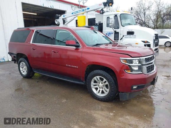 2020 Chevrolet Suburban LT with VIN 1GNSKHKC9LR233603, listed as a IAAI auction lot 41311582 with 104,754 mi miles. Bid and sale history available at carsss.com. Image 1.