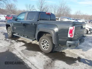 2015 GMC Canyon 4WD SLE z VIN 1GTG6BE31F1270675, wystawiony jako IAAI lot #41407183 z przebiegiem 143 117 mil mil oraz . Historia ofert i sprzedaży dostępna na DreamBid. Obrazek 3.