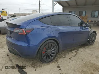 2022 Tesla Model Y Performance with VIN 7SAYGDEFXNF438281, listed as a Copart auction lot 53706435 with Not provided miles and Salvage title. Bid and sale history available at DreamBid. Image 3.