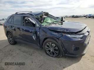 2024 Toyota RAV4 Hybrid XLE Premium with VIN JTMB6RFV4RD145174, listed as a Copart auction lot 48618325 with 6,652 mi miles and Salvage Title. Bid and sale history available at carsss.com. Image 4.