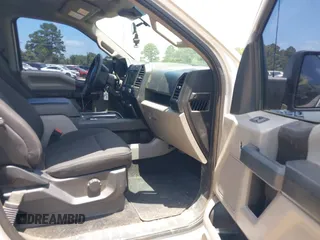 2019 Ford F-150 XL with VIN 1FTEW1EP5KKD24620, listed as a IAAI auction lot 42631896 with 123,583 mi miles and . Bid and sale history available at DreamBid. Image 5.