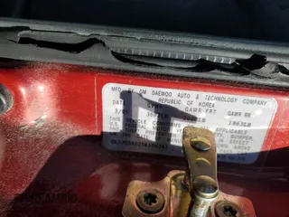 2005 Suzuki Forenza S z VIN KL5JD56Z55K196241, wystawiony jako Copart lot #88494775 z przebiegiem Nie podano mil oraz Nie do naprawy. Historia ofert i sprzedaży dostępna na DreamBid. Obrazek 14.