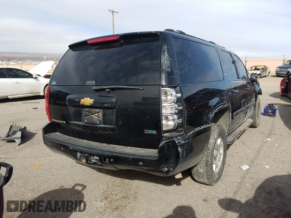 2012 Chevrolet Suburban LT with VIN 1GNSCJE05CR146514, listed as a Copart auction lot 28413650 with 230,681 mi miles and Salvage Title. Bid and sale history available at carsss.com. Image 4.