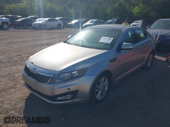 2013 Kia Optima EX z VIN 5XXGN4A76DG200422, wystawiony jako IAAI lot #42067904 z przebiegiem 278 808 mil mil oraz . Historia ofert i sprzedaży dostępna na DreamBid. Obrazek 2.