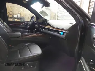 2021 Cadillac Escalade Luxury z VIN 1GYS4AKL7MR295510, wystawiony jako IAAI lot #38398966 z przebiegiem 26 228 mil mil oraz . Historia ofert i sprzedaży dostępna na DreamBid. Obrazek 5.