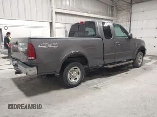 2002 Ford F-150 XL with VIN 1FTRX18W92KA81797, listed as a IAAI auction lot 42250147 with 162,918 mi miles and . Bid and sale history available at DreamBid. Image 4.