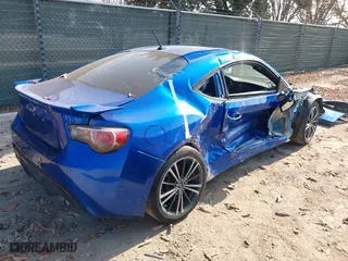 2014 Subaru BRZ Limited with VIN JF1ZCAC11E8602767, listed as a IAAI auction lot 41520227 with 117,311 mi miles. Bid and sale history available at carsss.com. Image 4.