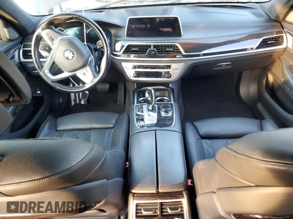 2018 BMW 7 Series 750i with VIN WBA7F0C5XJGM22674, listed as a Copart auction lot 74833524 with 0 mi miles and Salvage Title. Bid and sale history available at carsss.com. Image 8.