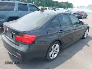 2013 BMW 3 Series 328i xDrive with VIN WBA3B3C54DJ810762, listed as a IAAI auction lot 42399930 with 201,014 mi miles and . Bid and sale history available at DreamBid. Image 4.