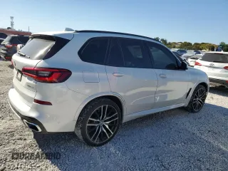 2019 BMW X5 xDrive40i with VIN 5UXCR6C50KLK86199, listed as a Copart auction lot 47523305 with 76,924 mi miles and Salvage Title. Bid and sale history available at DreamBid. Image 3.