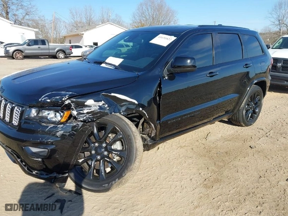2021 Jeep Grand Cherokee Laredo X with VIN 1C4RJFAG4MC529961, listed as a IAAI auction lot 41651822 with 32,601 mi miles. Bid and sale history available at carsss.com. Image 2.