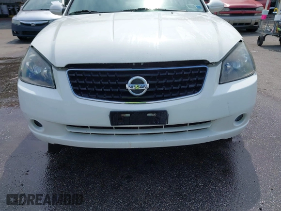 2006 Nissan Altima 2.5 with VIN 1N4AL11D06N329835, listed as a IAAI auction lot 41756507 with 152,803 mi miles. Bid and sale history available at carsss.com. Image 14.