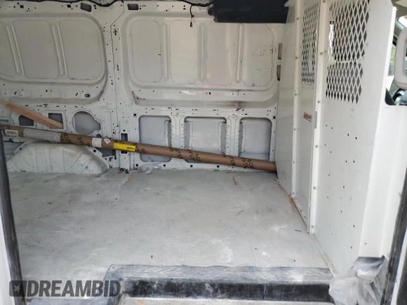 2015 Ford Transit Cargo with VIN 1FTNR1ZM2FKA76906, listed as a Copart auction lot 67441514 with 264,616 mi miles and Salvage Title. Bid and sale history available at DreamBid. Image 12.