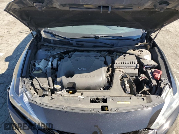 2018 Nissan Maxima SR with VIN 1N4AA6AP9JC371440, listed as a Copart auction lot 75309784 with 68,459 mi miles and Salvage Title. Bid and sale history available at carsss.com. Image 12.