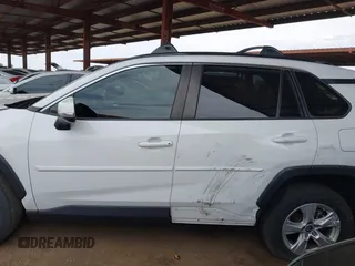 2019 Toyota RAV4 XLE with VIN JTMW1RFV0KD026561, listed as a IAAI auction lot 42035063 with 51,670 mi miles. Bid and sale history available at carsss.com. Image 14.