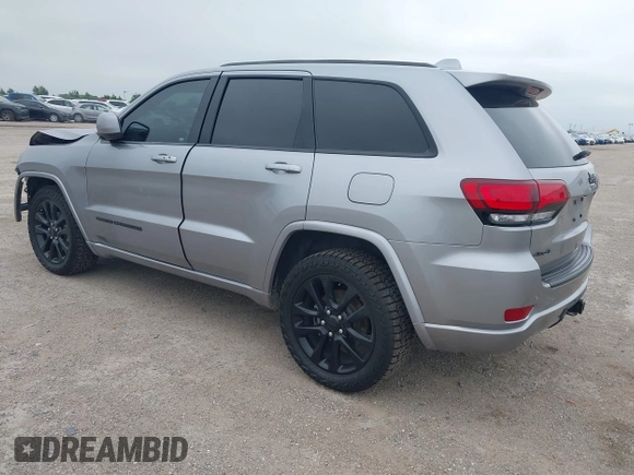 2019 Jeep Grand Cherokee Laredo E with VIN 1C4RJFAG9KC670974, listed as a IAAI auction lot 42333028 with 163,958 mi miles and . Bid and sale history available at DreamBid. Image 3.