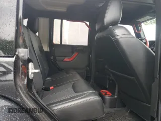 2015 Jeep Wrangler Unlimited Sahara with VIN 1C4BJWEG6FL643460, listed as a Copart auction lot 58557765 with 130,181 mi miles and Salvage title. Bid and sale history available at DreamBid. Image 10.