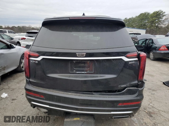 2022 Cadillac XT6 Premium Luxury with VIN 1GYKPCRS7NZ143003, listed as a Copart auction lot 86708864 with 0 mi miles and Salvage Title. Bid and sale history available at carsss.com. Image 6.