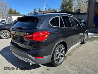 2017 BMW X1 xDrive28i with VIN WBXHT3C32H5F67896, listed as a IAAI auction lot 41823288 with 80,130 mi miles. Bid and sale history available at carsss.com. Image 4.