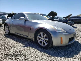 2004 Nissan 350Z Enthusiast with VIN JN1AZ34D84M100633, listed as a Copart auction lot 61036114 with 36,810 mi miles and Salvage Title. Bid and sale history available at DreamBid. Image 4.