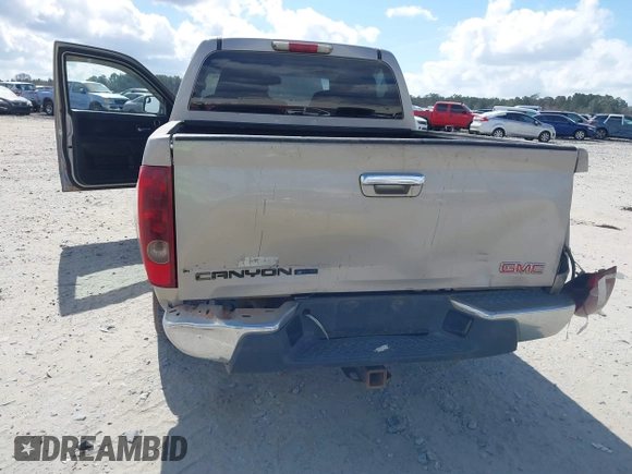 2009 GMC Canyon SLE1 with VIN 1GTCS139998131563, listed as a IAAI auction lot 41561682 with 211,603 mi miles. Bid and sale history available at carsss.com. Image 6.
