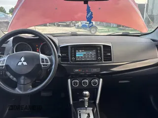 2016 Mitsubishi Lancer SE with VIN JA32V2FW5GU013006, listed as a Copart auction lot 55860815 with 122,815 mi miles and Clean Title. Bid and sale history available at carsss.com. Image 9.
