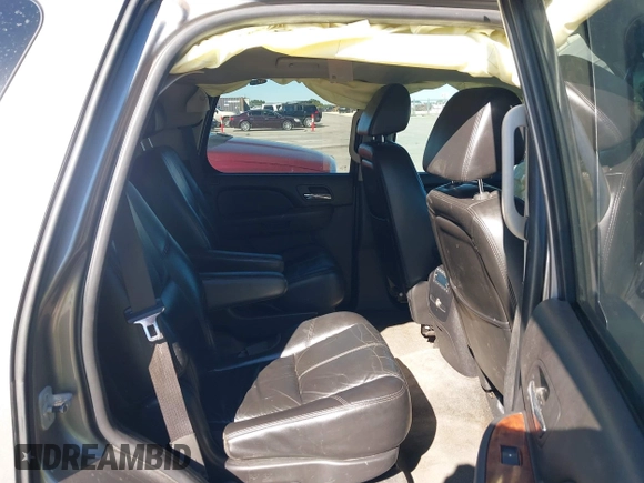 2007 Chevrolet Tahoe LTZ with VIN 1GNFC13J97R155705, listed as a IAAI auction lot 40914171 with 165,727 mi miles and . Bid and sale history available at DreamBid. Image 8.