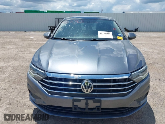 2019 Volkswagen Jetta S z VIN 3VWC57BUXKM061537, wystawiony jako IAAI lot #42170921 z przebiegiem 88 476 mil mil oraz . Historia ofert i sprzedaży dostępna na DreamBid. Obrazek 12.