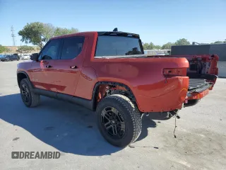 2024 Rivian R1T Adventure z VIN 7FCTGCAA3RN030346, wystawiony jako Copart lot #49440515 z przebiegiem 12 772 mil mil oraz Szkoda całkowita • Salvage title. Historia ofert i sprzedaży dostępna na DreamBid. Obrazek 2.