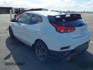 2019 Hyundai Veloster N with VIN KMHT36AH6KU001916, listed as a IAAI auction lot 41577775 with 77,471 mi miles. Bid and sale history available at carsss.com. Image 3.