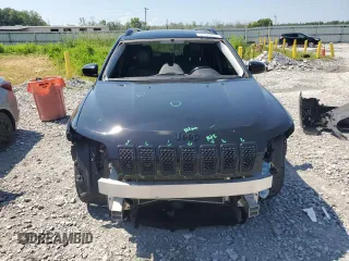 2021 Jeep Cherokee Altitude with VIN 1C4PJLLBXMD144549, listed as a Copart auction lot 62163435 with 94,571 mi miles and Salvage title. Bid and sale history available at DreamBid. Image 5.