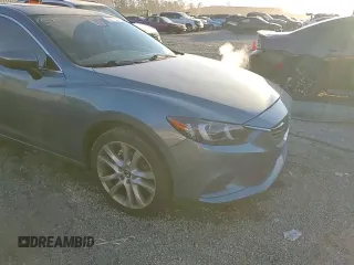 2014 Mazda Mazda6 i Touring with VIN JM1GJ1T55E1110567, listed as a Copart auction lot 83671234 with 143,824 mi miles and Salvage Title. Bid and sale history available at carsss.com. Image 13.
