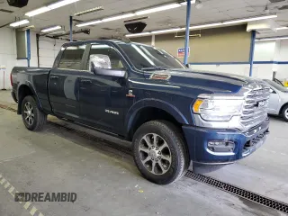 2023 Ram 2500 Longhorn with VIN 3C6UR5GL4PG646451, listed as a Copart auction lot 77141314 with 9,852 mi miles and Salvage Title. Bid and sale history available at carsss.com. Image 4.