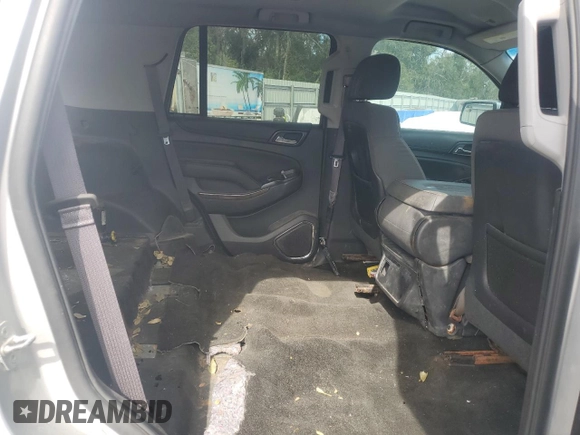 2015 Chevrolet Tahoe z VIN 1GNSK3EC3FR305401, wystawiony jako Copart lot #80819994 z przebiegiem Nie podano mil oraz Szkoda całkowita • Salvage title. Historia ofert i sprzedaży dostępna na DreamBid. Obrazek 11.