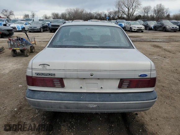 1991 Ford Taurus with VIN 1FACP52U9MG101093, listed as a Copart auction lot 45948105 with 594,696 mi miles and Salvage title. Bid and sale history available at DreamBid. Image 6.