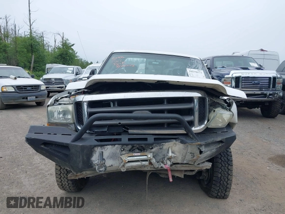 2004 Ford Super Duty F-250 XL with VIN 1FTNX21PX4EA25232, listed as a IAAI auction lot 39570173 with 246,165 mi miles. Bid and sale history available at carsss.com. Image 12.