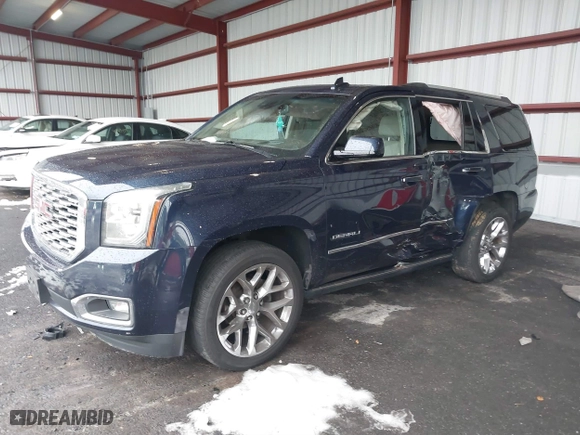 2018 GMC Yukon Denali with VIN 1GKS2CKJ5JR335718, listed as a IAAI auction lot 40991126 with 87,479 mi miles. Bid and sale history available at carsss.com. Image 17.