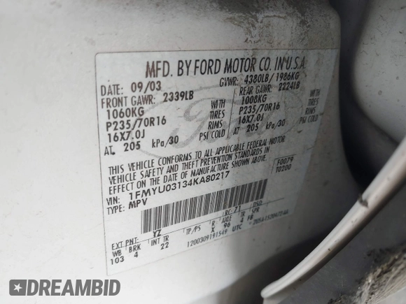 2004 Ford Escape XLT with VIN 1FMYU03134KA80217, listed as a IAAI auction lot 41672764 with 184,601 mi miles. Bid and sale history available at carsss.com. Image 9.