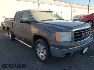 2008 GMC Sierra 1500 SLE1 with VIN 2GTEK13M581217452, listed as a IAAI auction lot 41394439 with 156,004 mi miles. Bid and sale history available at carsss.com. Image 1.